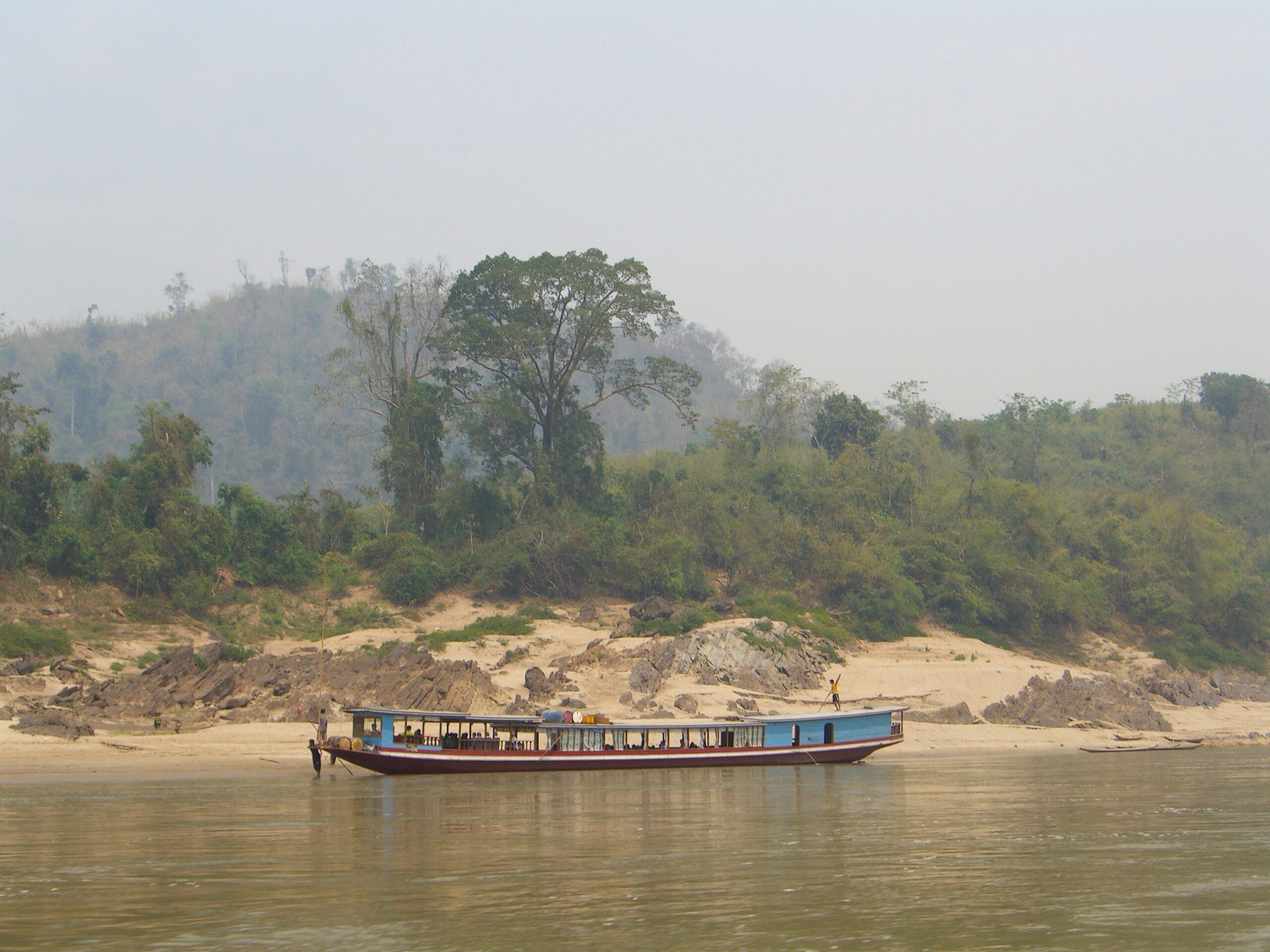 One of the infamous slow boats makes its way down the Mekong