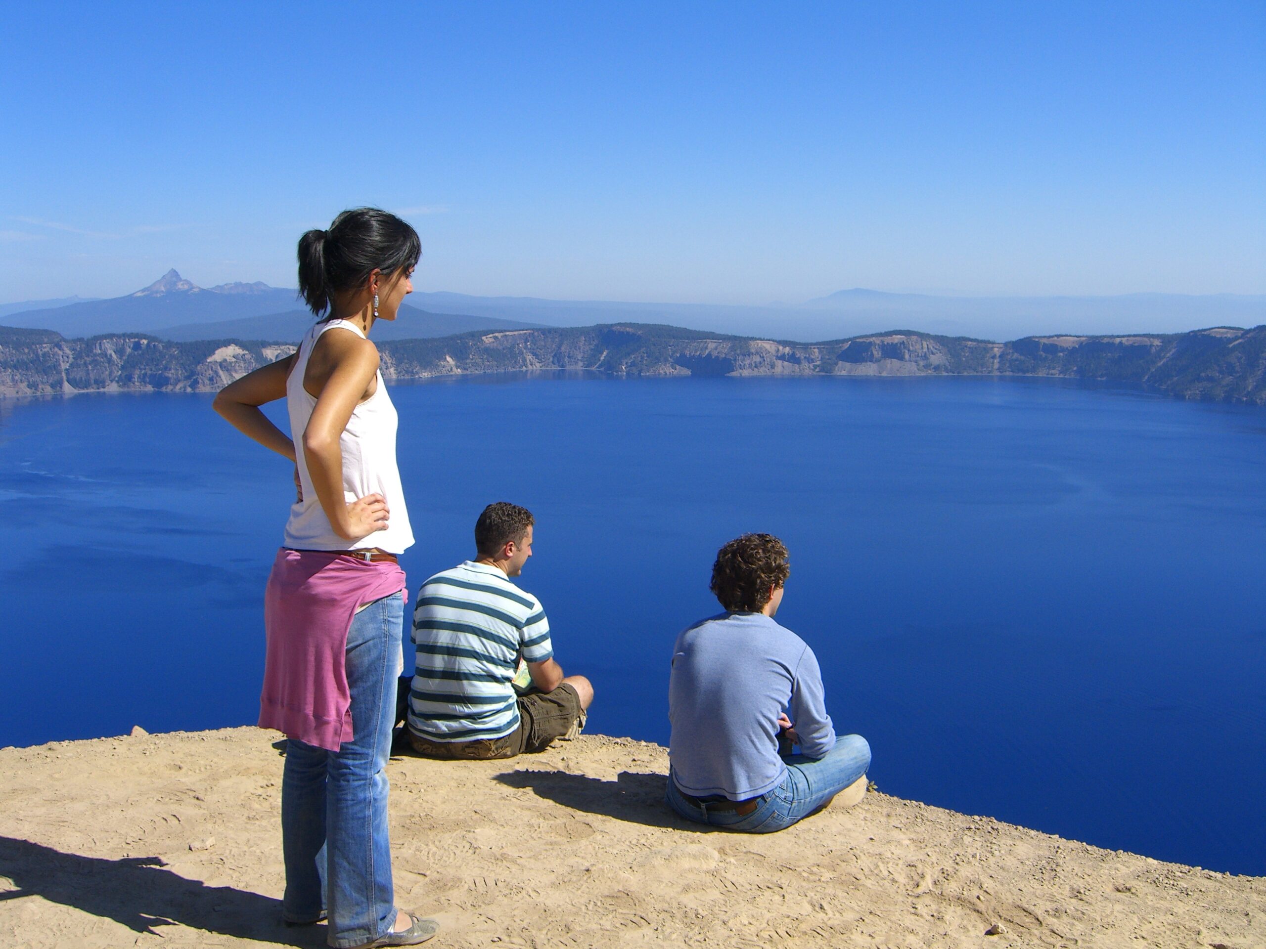 Beatrice, Hank, and Brian gaze at Crater Lake.