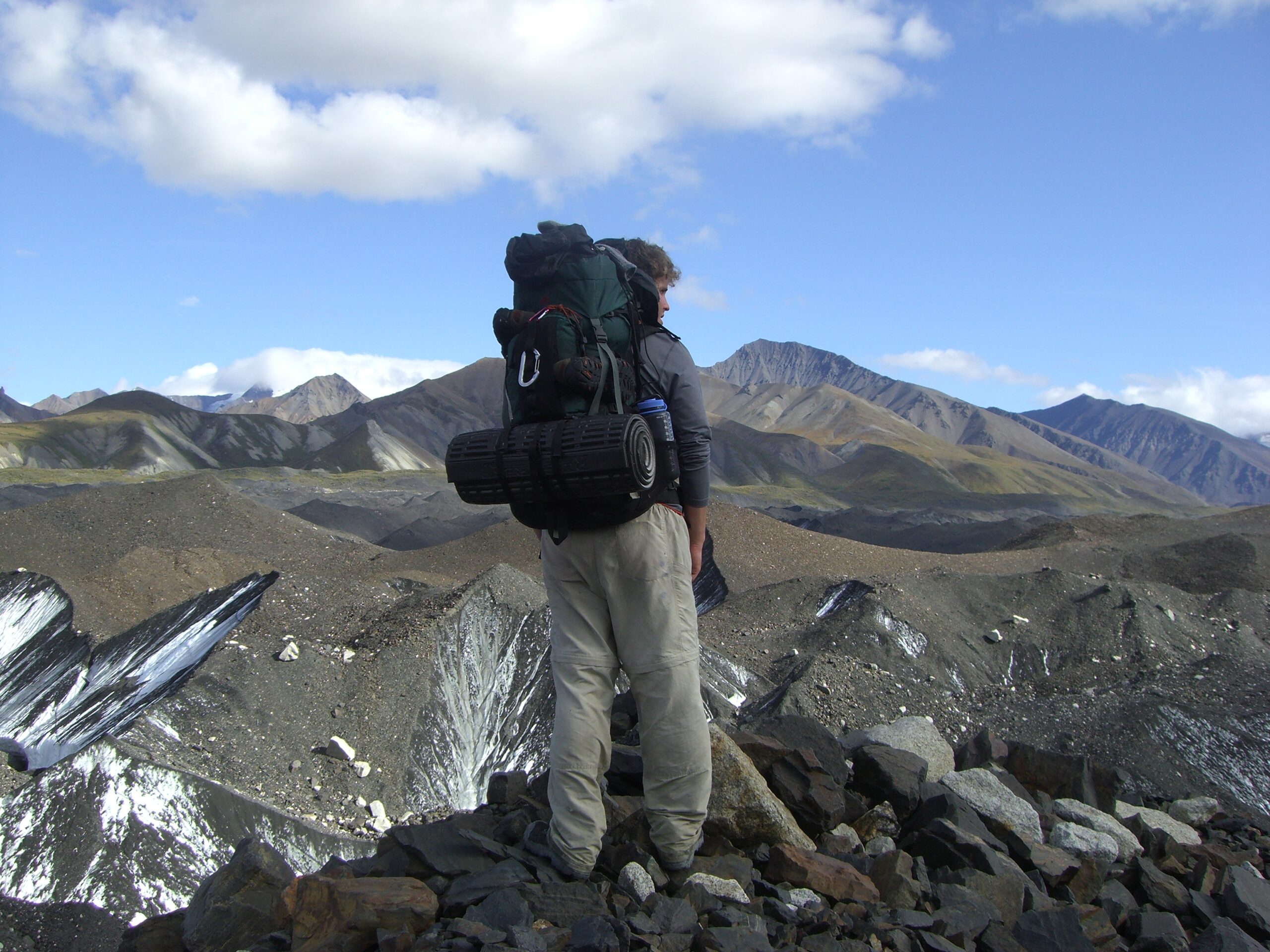 Brian looks across Muldrow Glacier from the top of one of its many peaks.