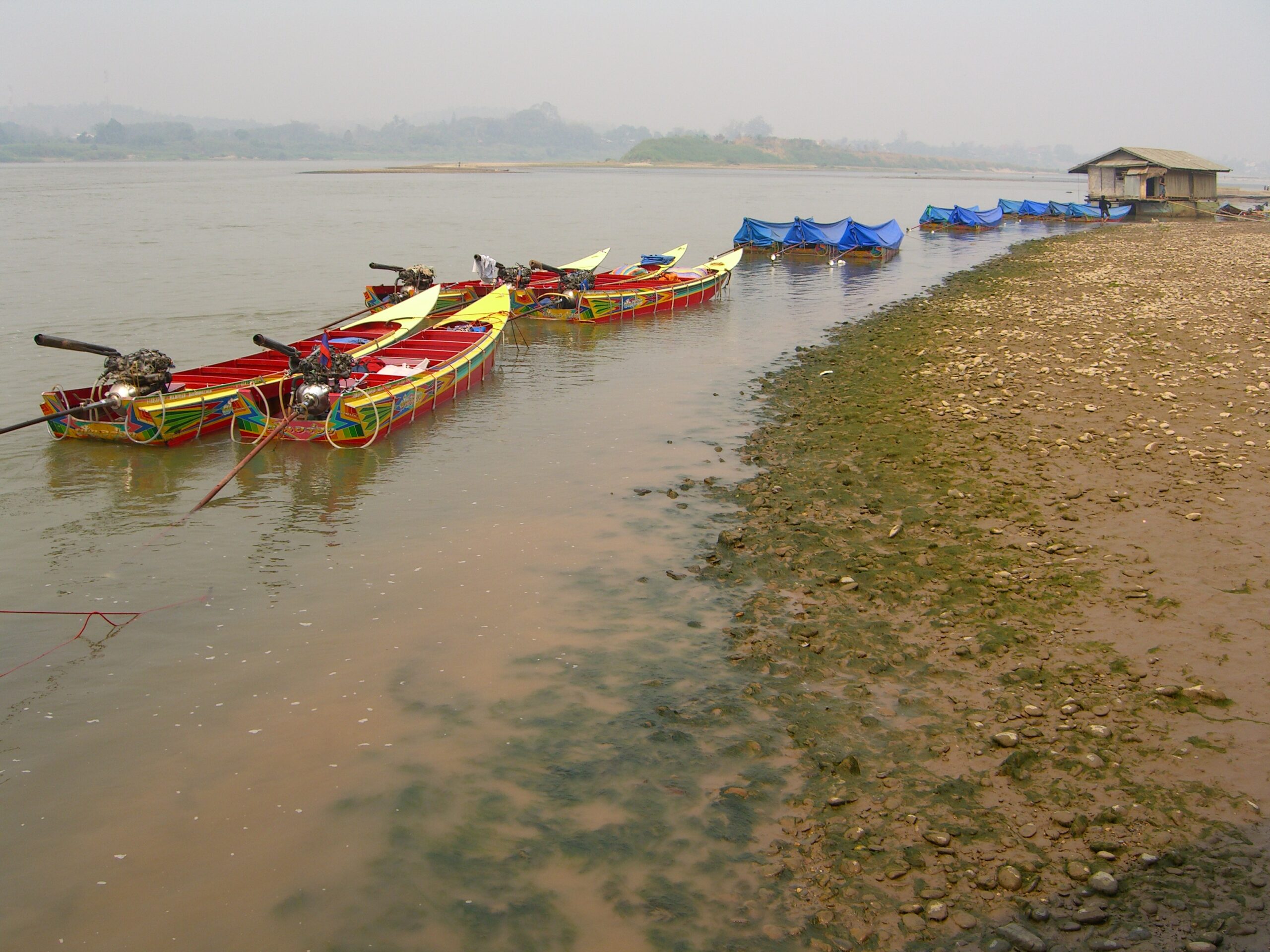 Speed boats on the Mekong River in Huay Xai, Laos