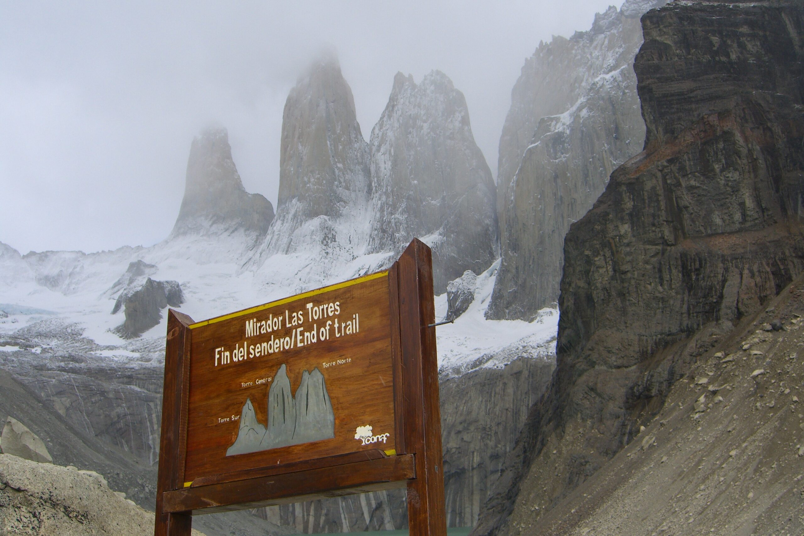 An end-of-trail sign greets hikers below the Torres del Paine in Chilean Patagonia.