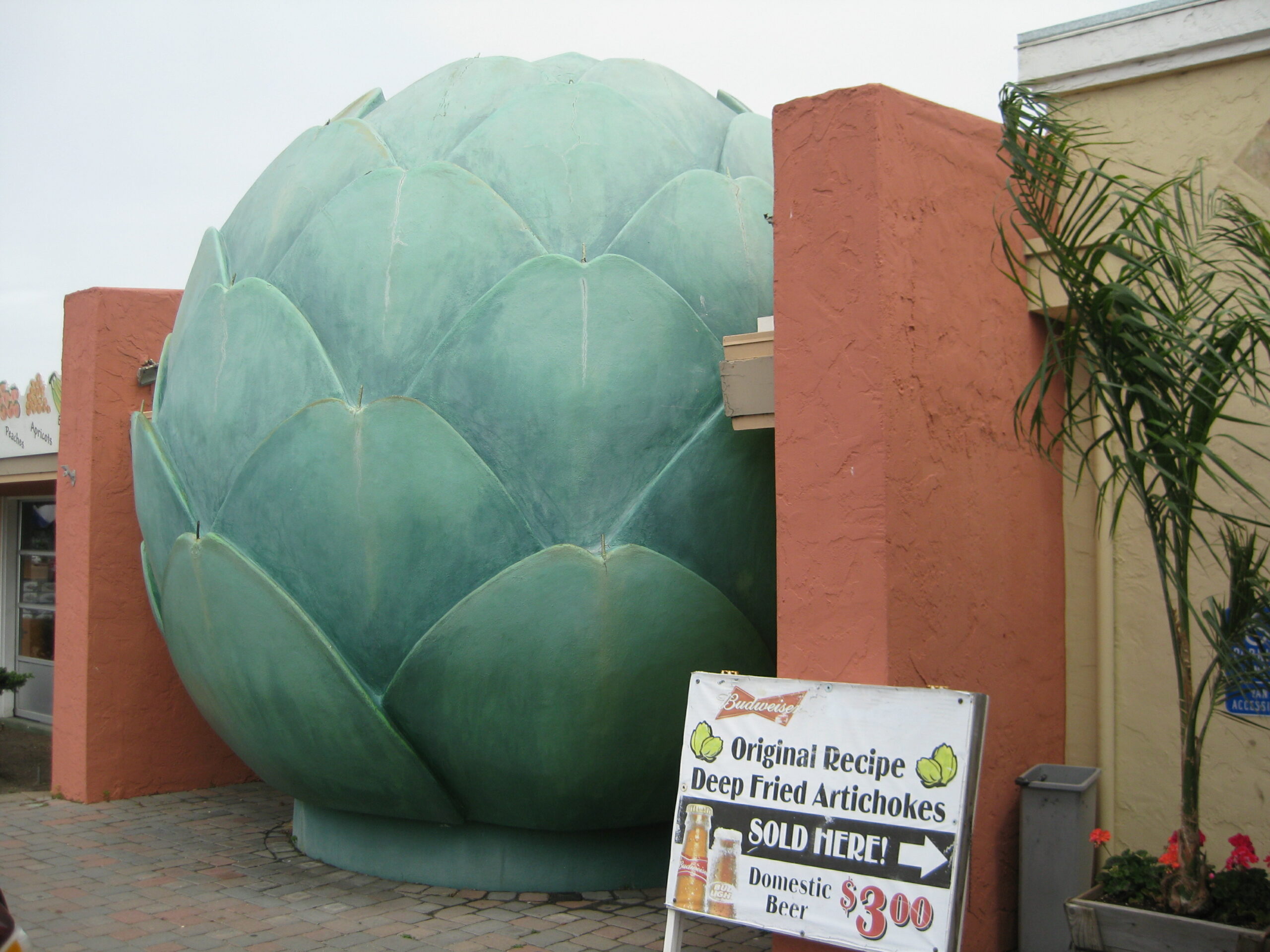 A sculpture of an artichoke sits outside the World Famous Giant Artichoke Family Restaurant in Castroville, California.
