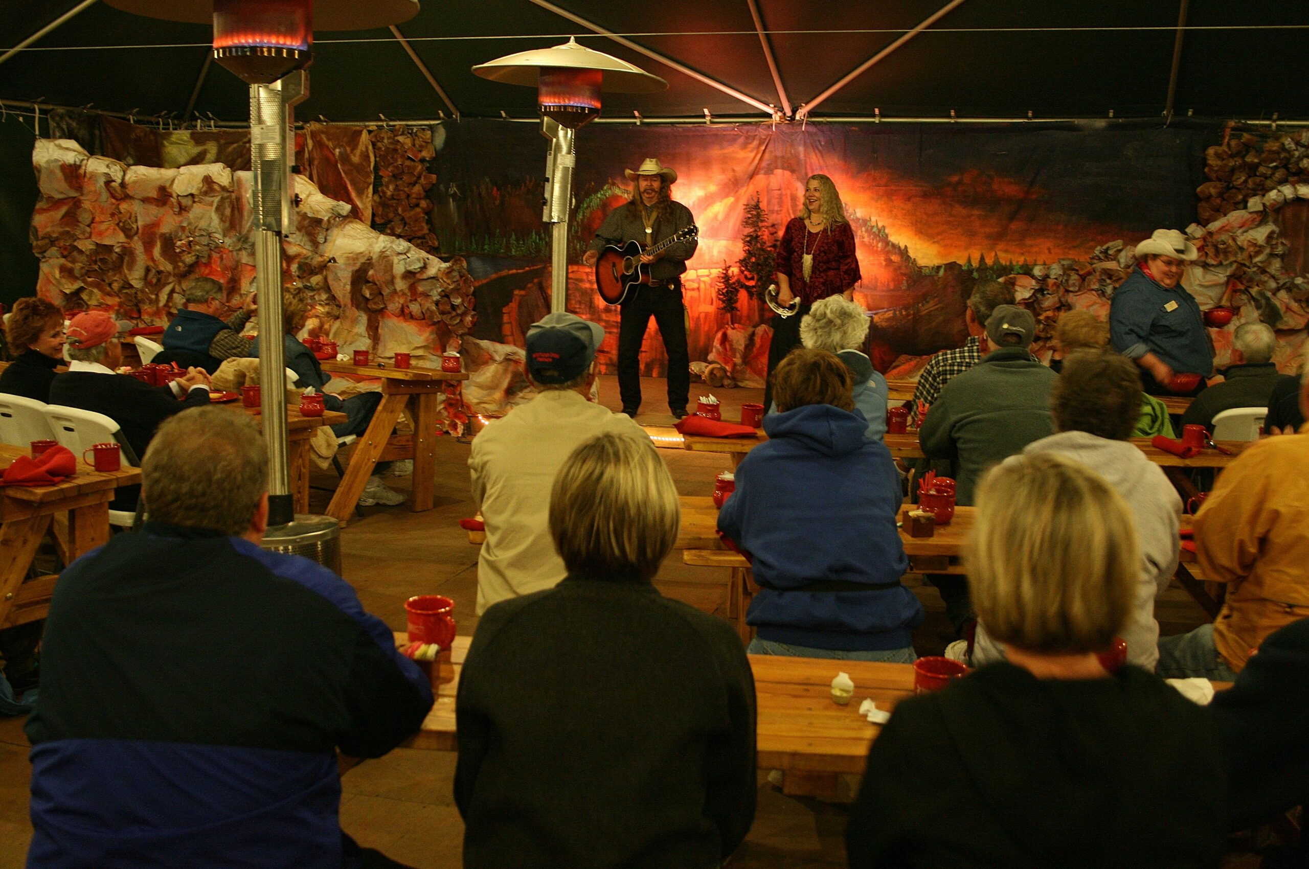 Woodie and Cleta-Jane Cochran entertain guests at the Grand Canyon Cookout Experience on the North Rim.