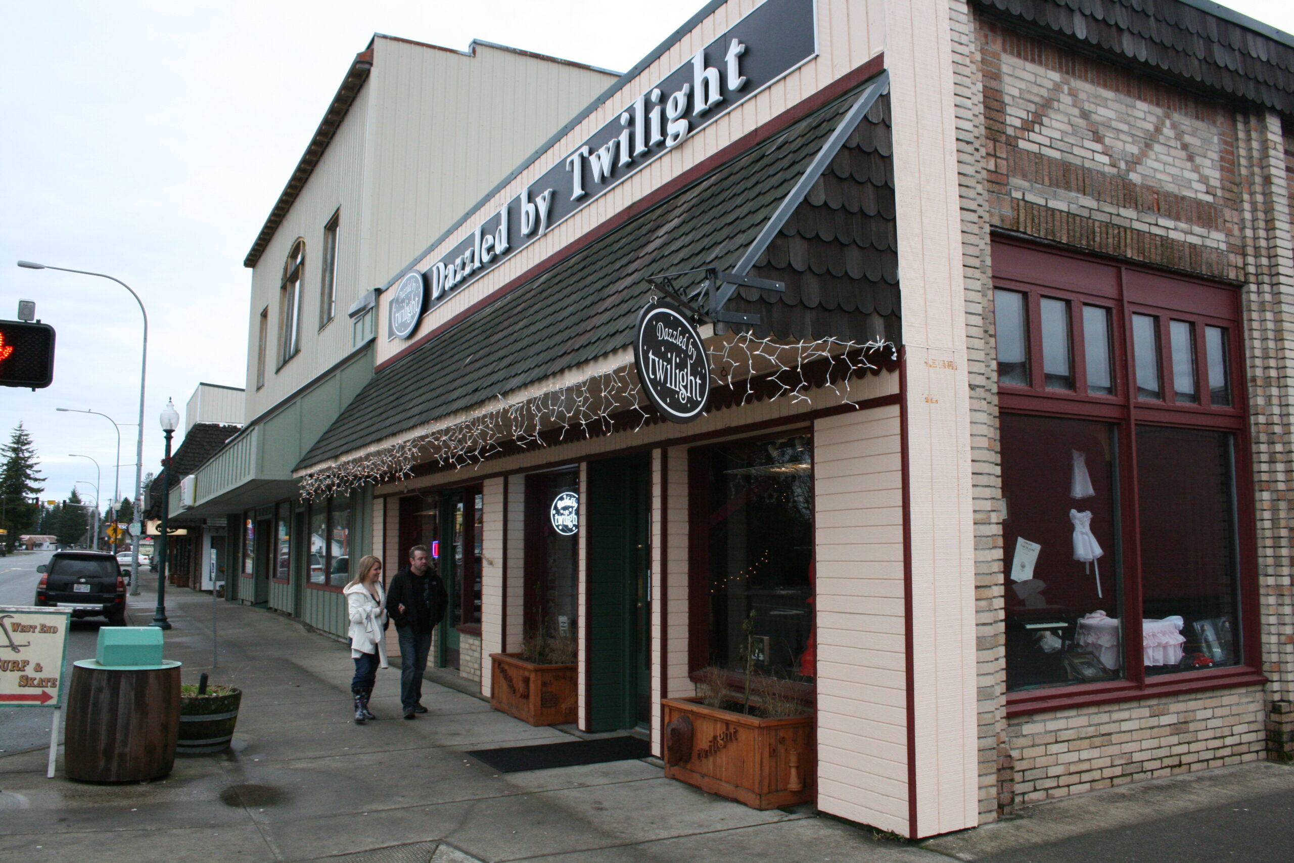 Tourists walk outside the Dazzled by Twilight store in Forks, Washington.