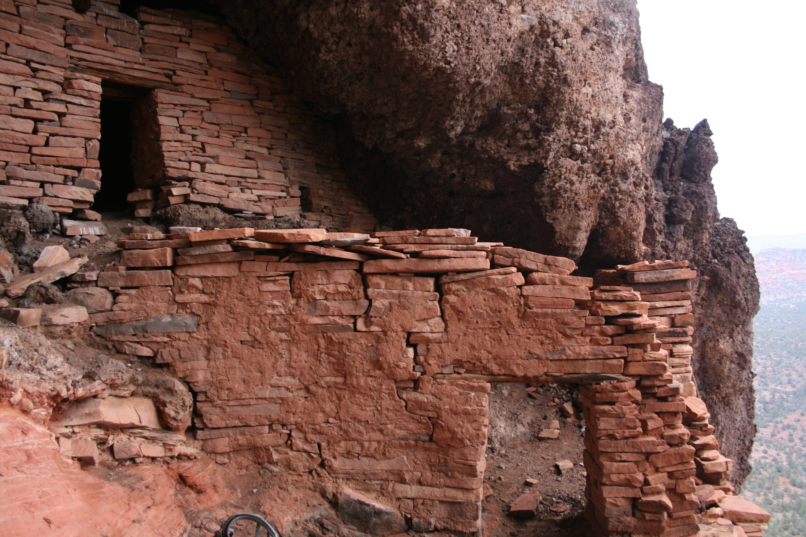 Verde Hohokam cliff dwelling ruins sit near the rim of Sycamore Canyon in Arizona.