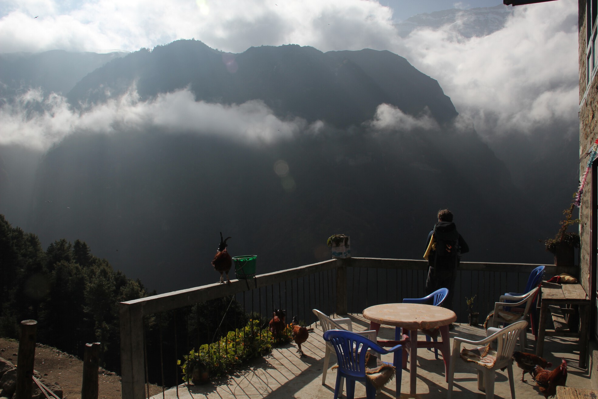 Brian looks toward a mountain from a guesthouse patio near Namche Bazaar, Nepal.