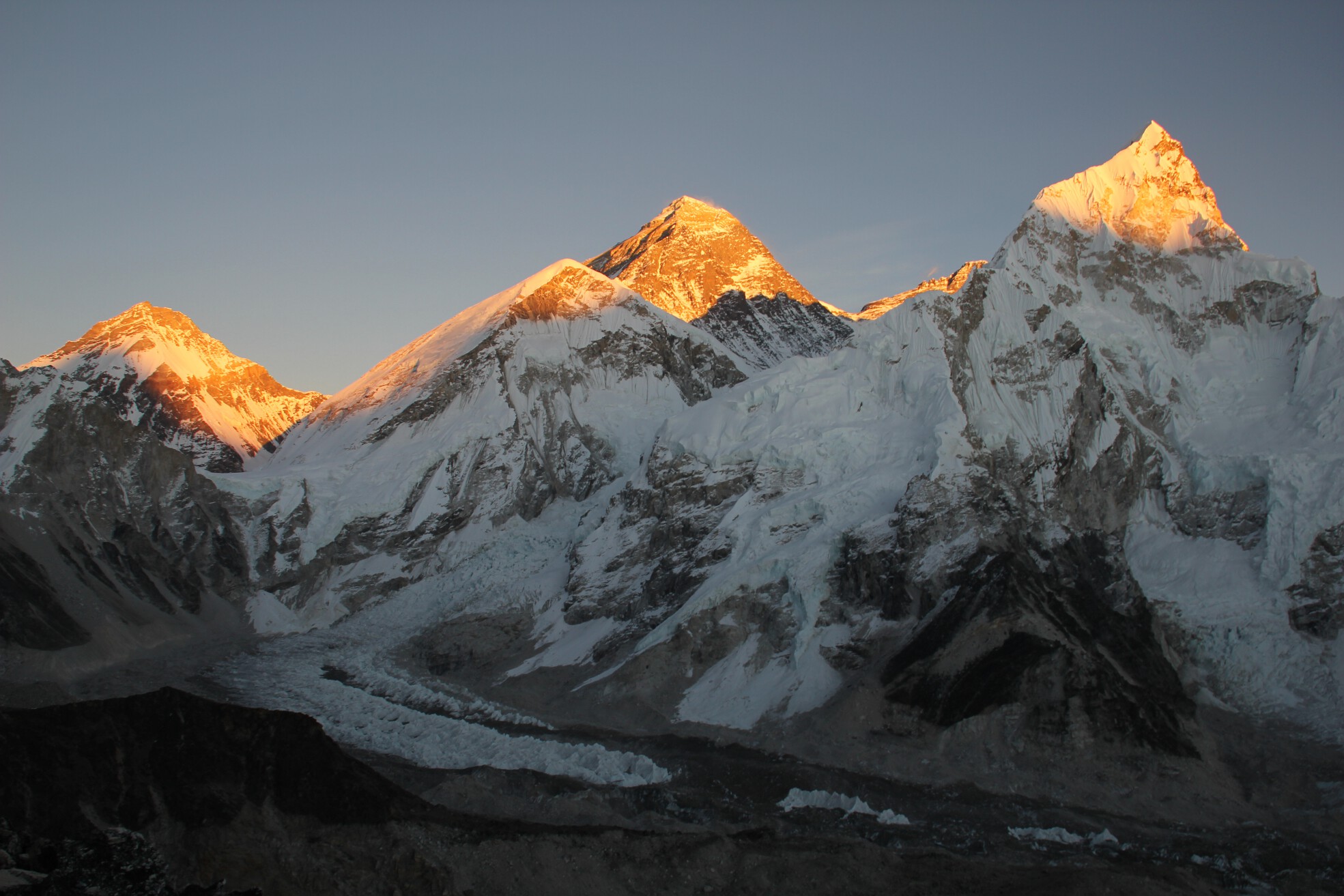 Sunlight illuminates Mount Everest during a sunset seen from Kala Patthar, Nepal.
