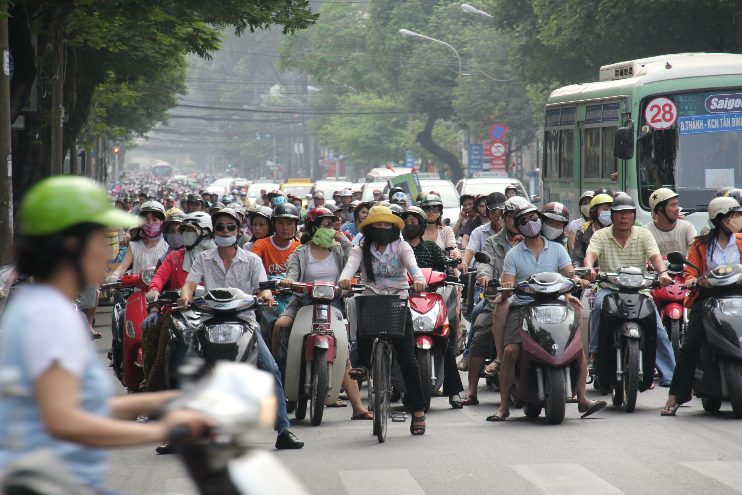 The "economic miracle" of capitalism has deeply infiltrated Ho Chi Minh City, Vietnam, where most own a motorized scooter.