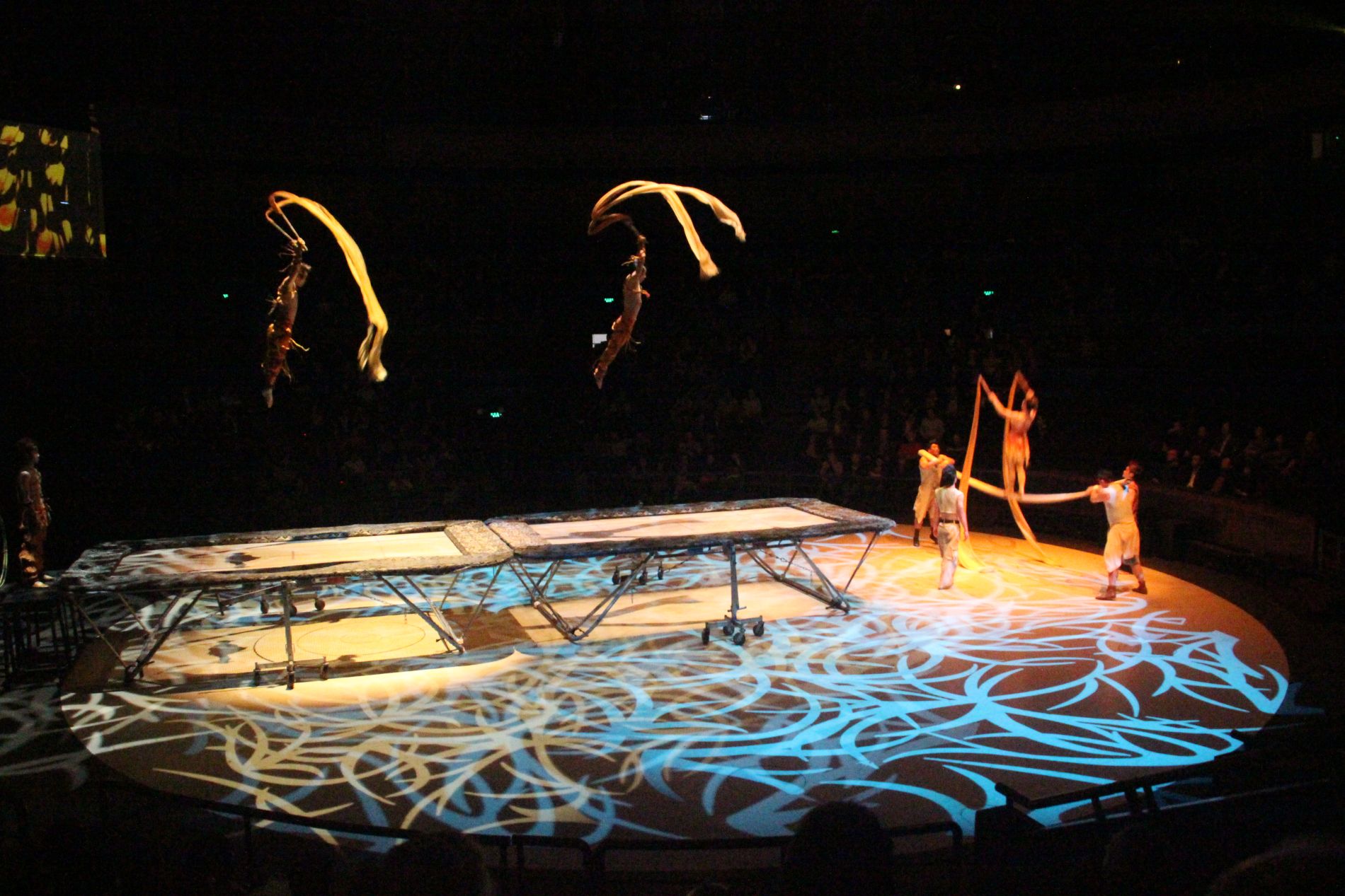 Chinese acrobats jump on trampolines at Shanghai Circus World.