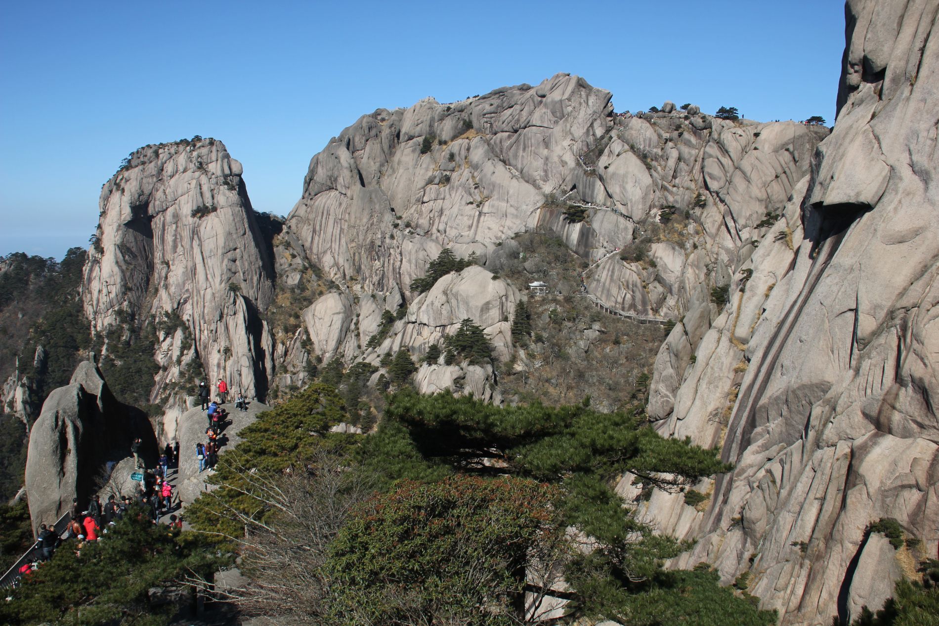 Chinese tour groups hike up stairs on China's Huangshan (Yellow Mountain).