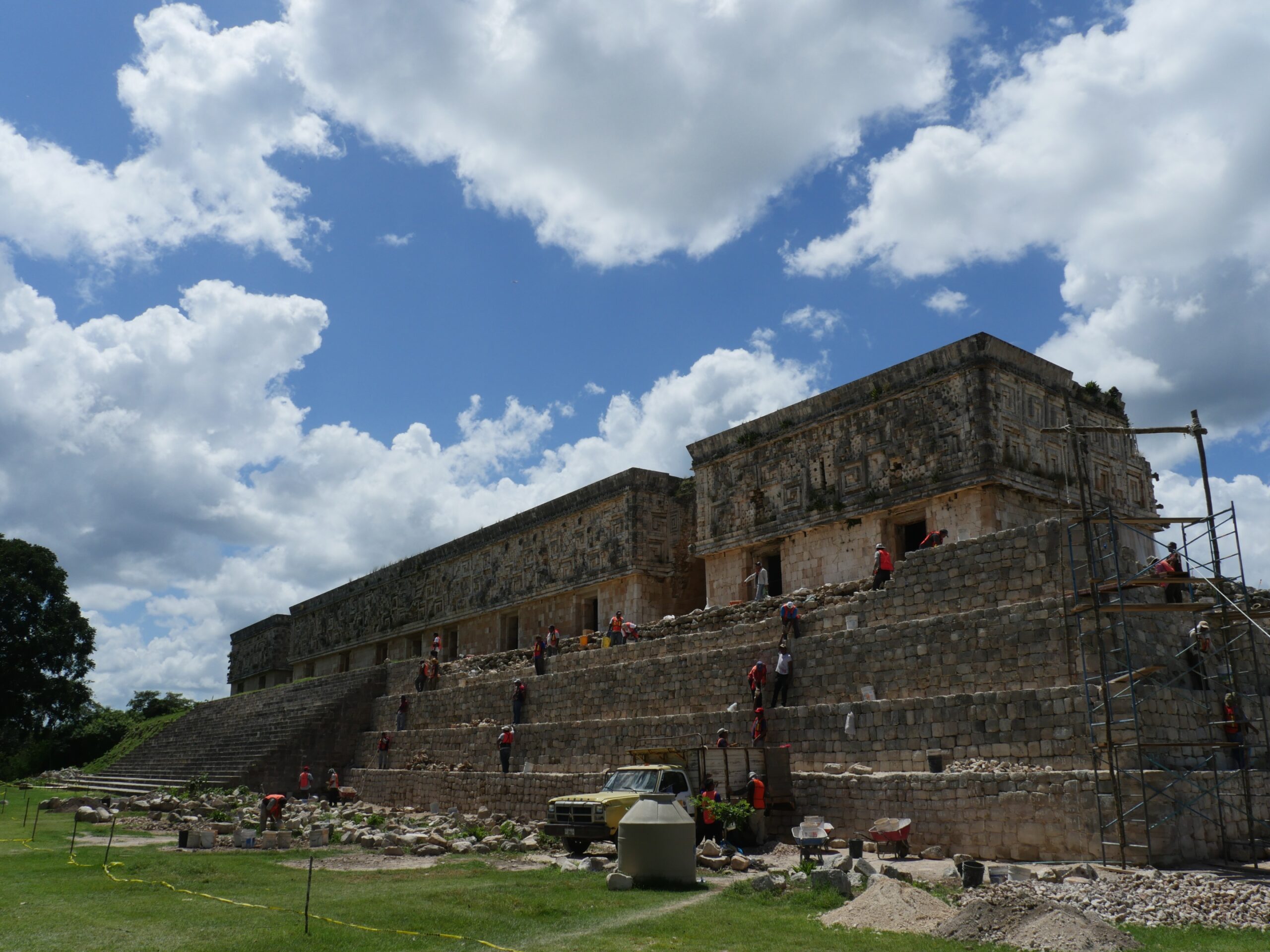Construction workers work to restore the ruins of the Palace of the Governor in Uxmal, Mexico.