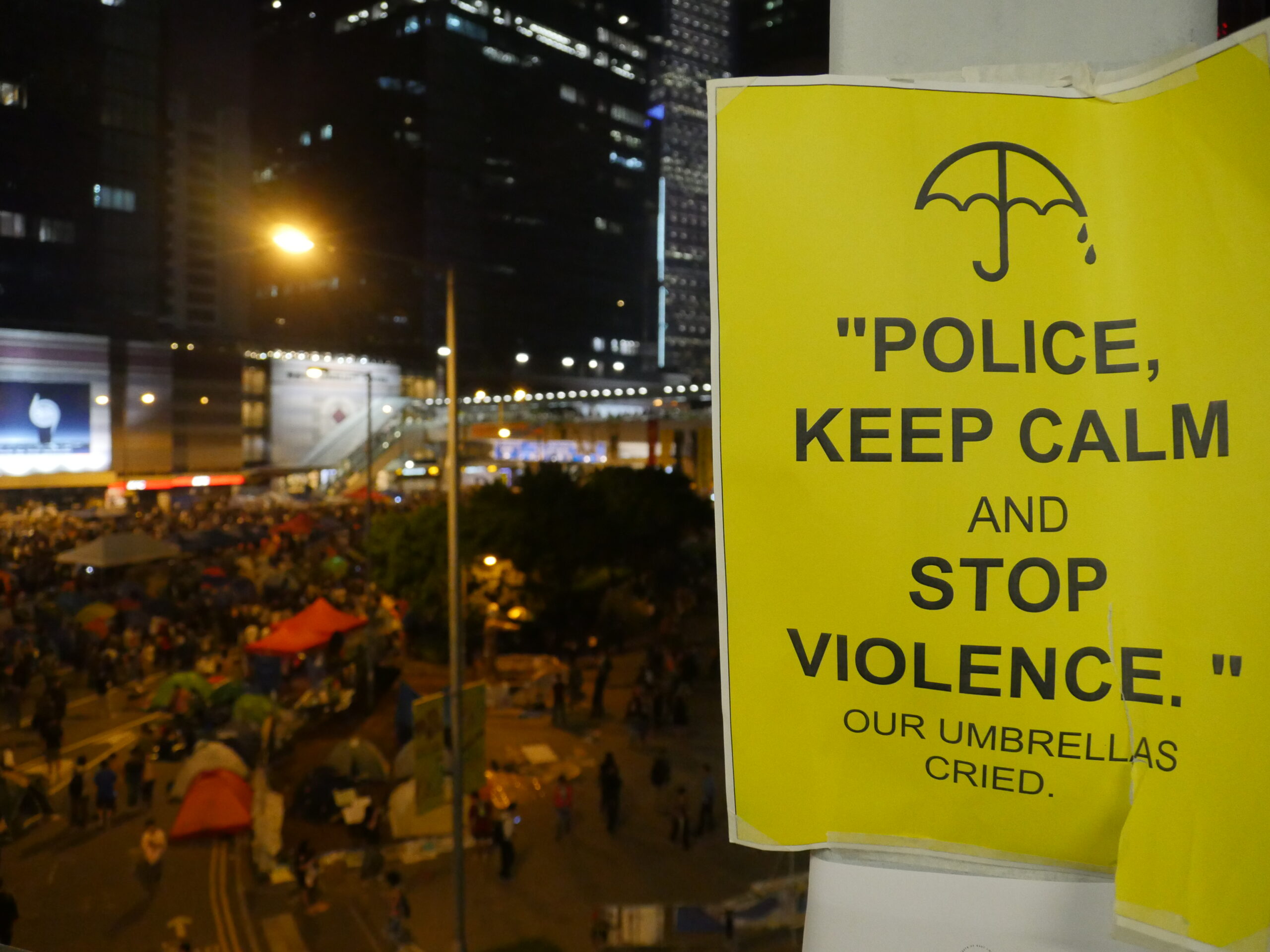A sign pleads with the Hong Kong police at Occupy Central.