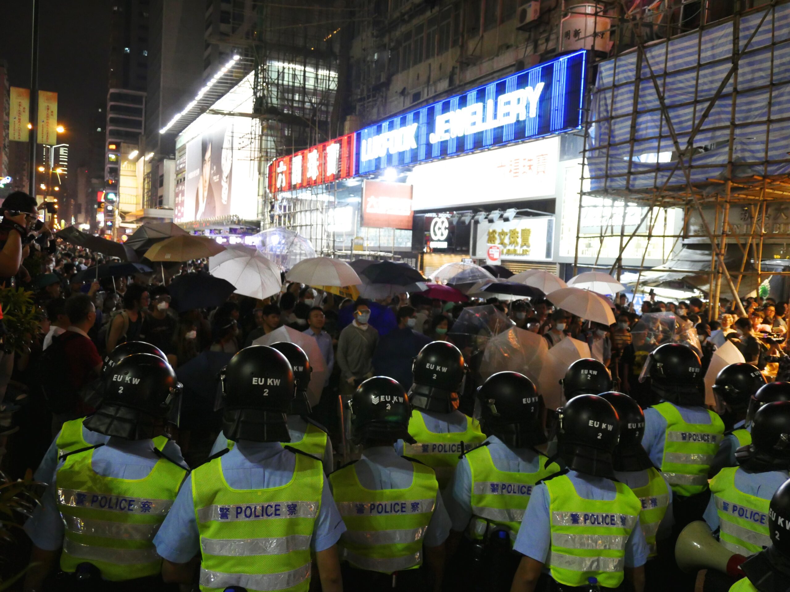 Police face off with umbrella-wielding protesters in the Mong Kok neighborhood of Hong Kong.