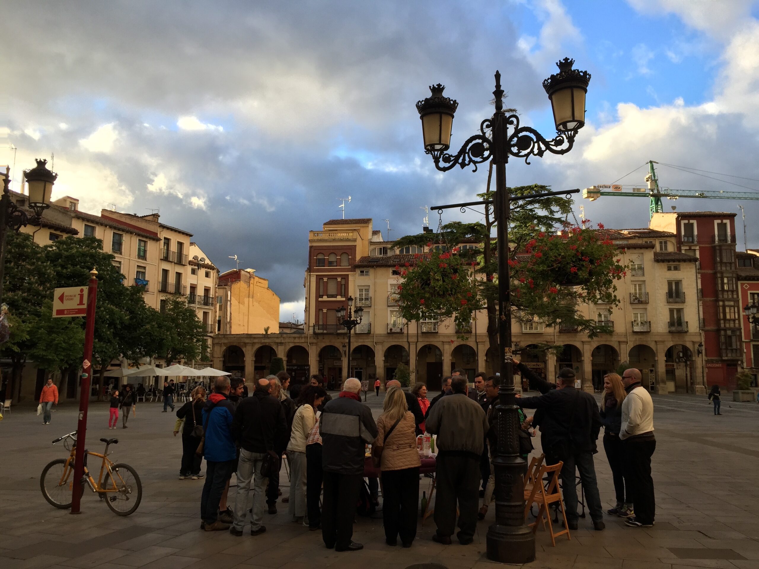People gather in a plaza in Logro&ntilde;o, Spain.