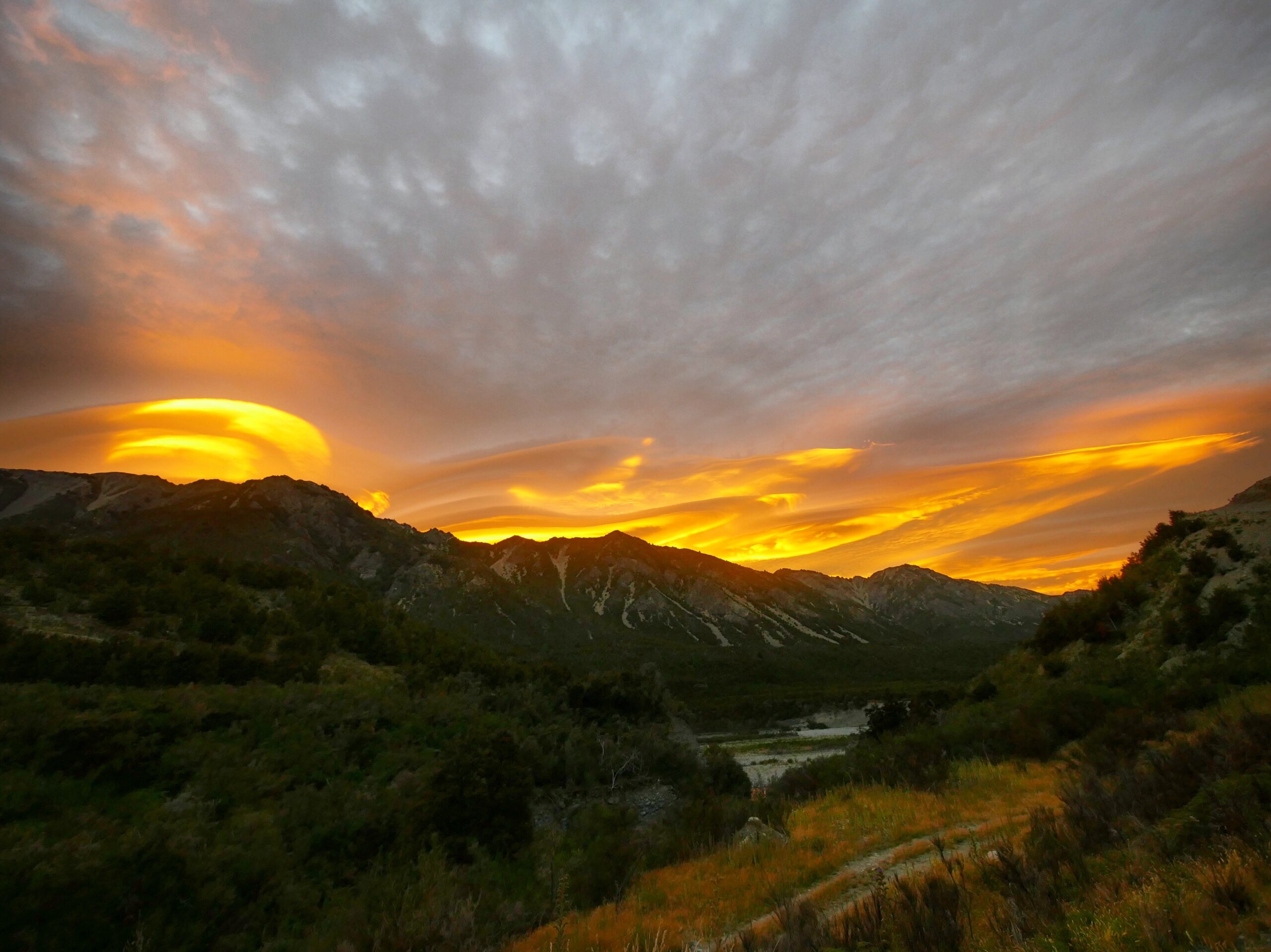 The sun rises over the Waiau River valley.